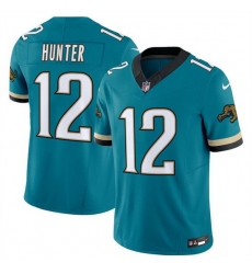 Youth Jacksonville Jaguars 12 Travis Hunter Teal 2025 Draft F U S E Prowler Throwback Vapor Limited Stitched Football Jersey Youth Jacksonville Jaguars 12 Travis Hunter Teal 2025 Draft F U S E Prowler Throwback Vapor Limited Stitched Football Jersey